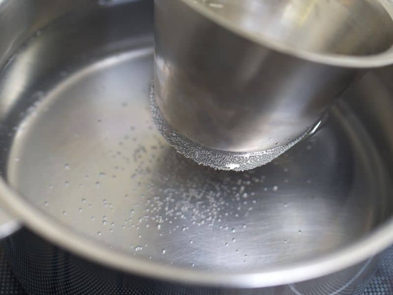 melt candle wax on a stove